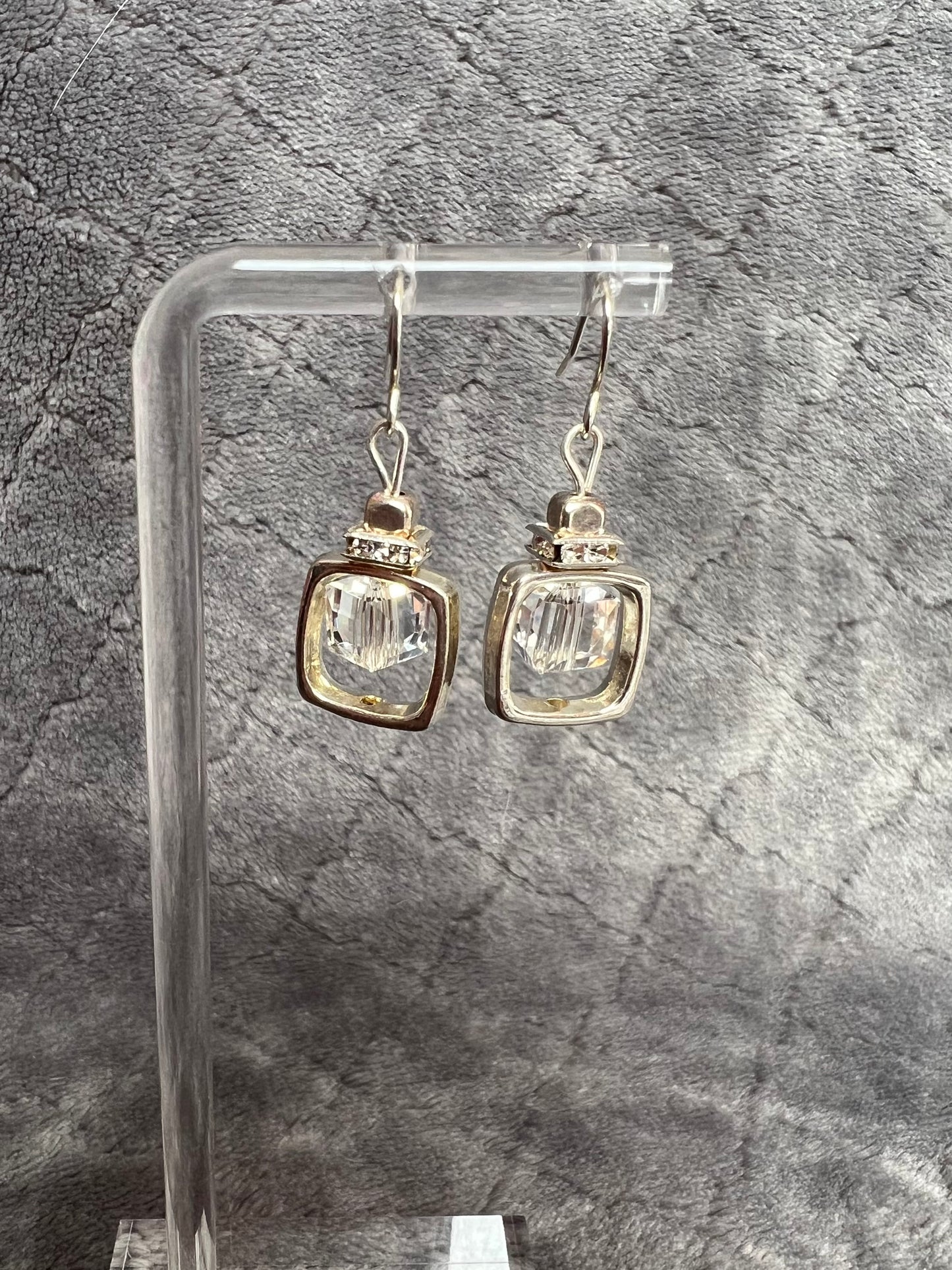 Earrings- Silver plated metal with clear crystal square rondelle and square crystal bead in center.