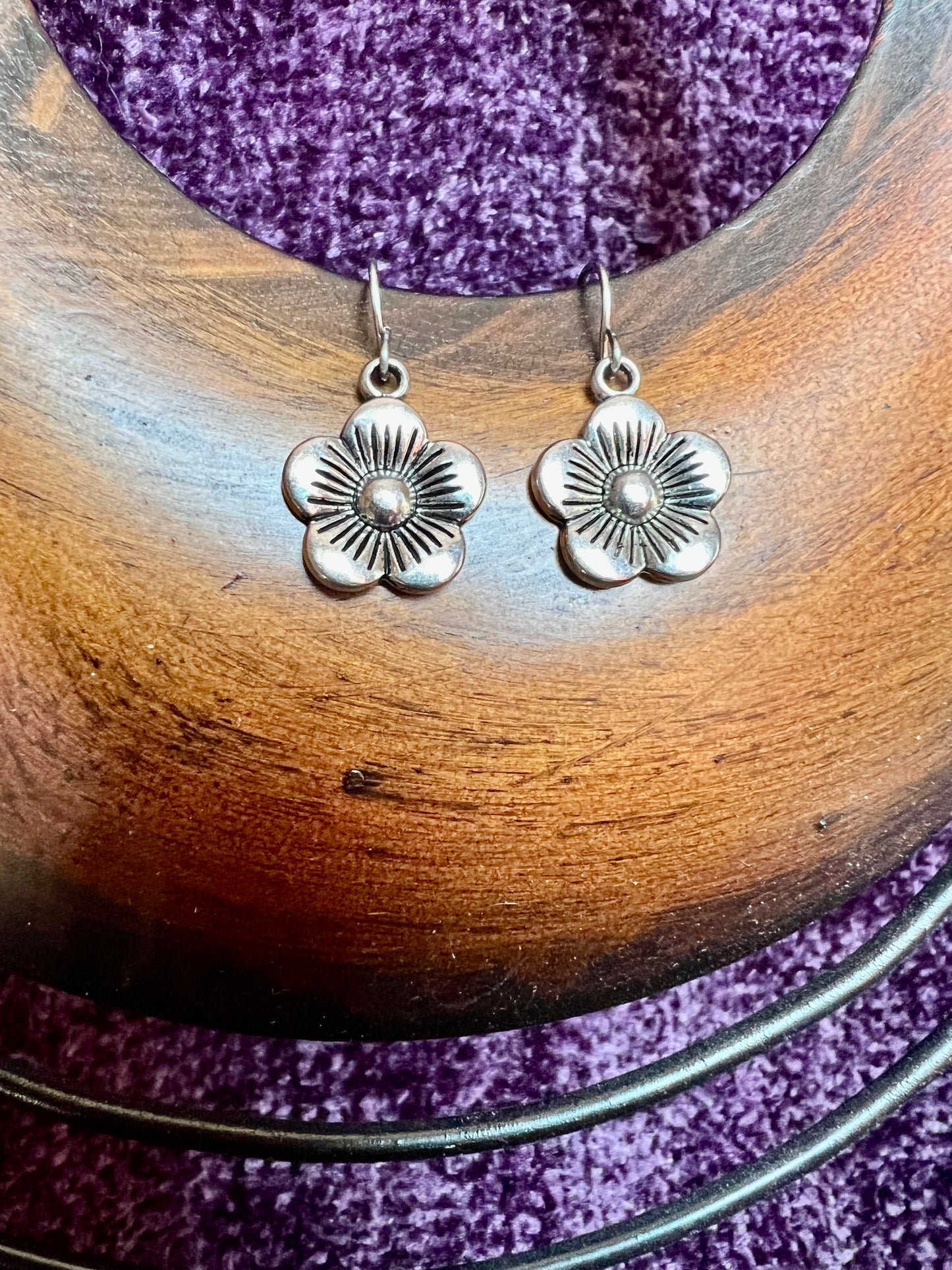 Earrings- Silver plated metal flowers.