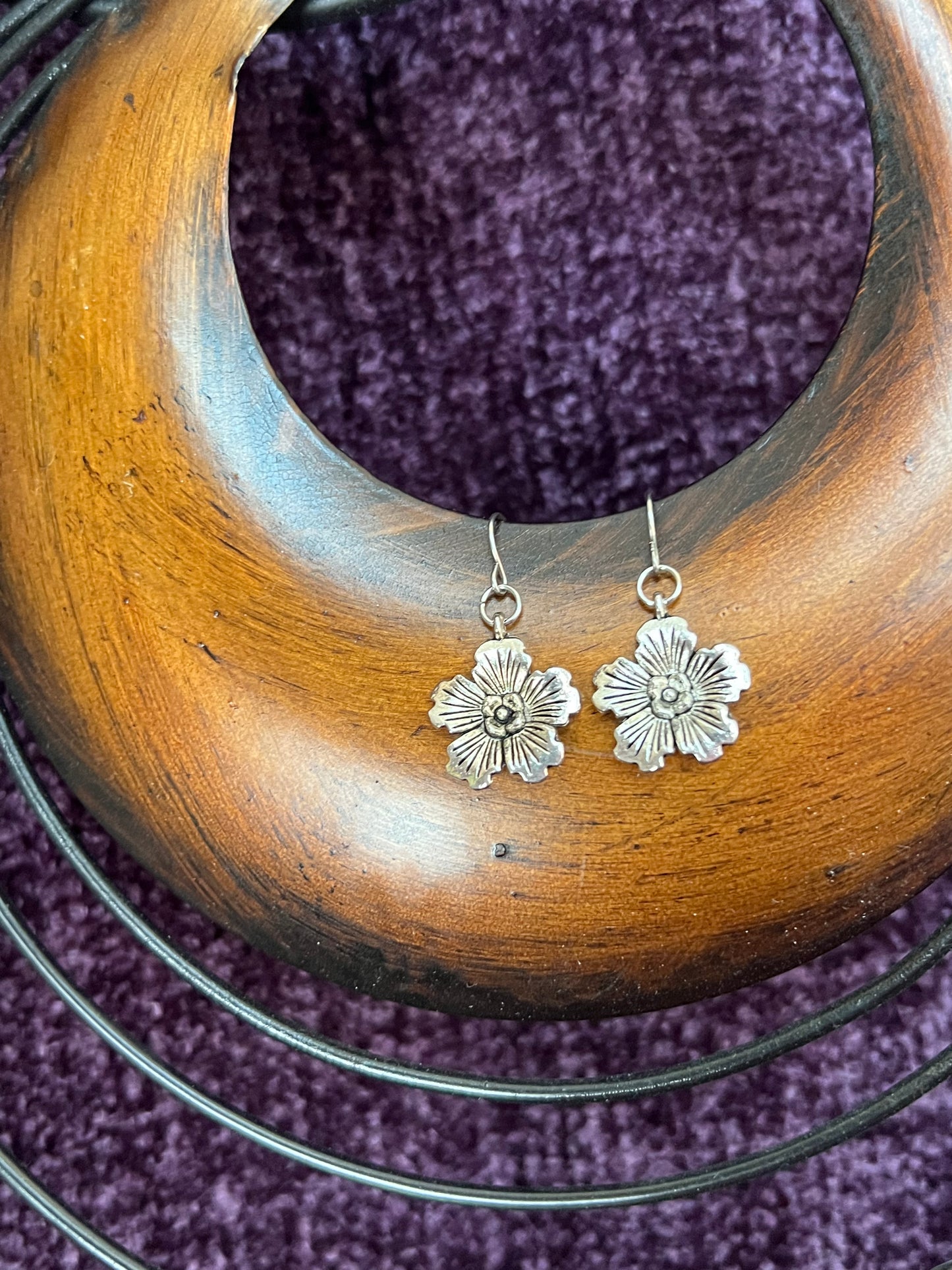 Earrings- Silver plated metal hibiscus flowers.