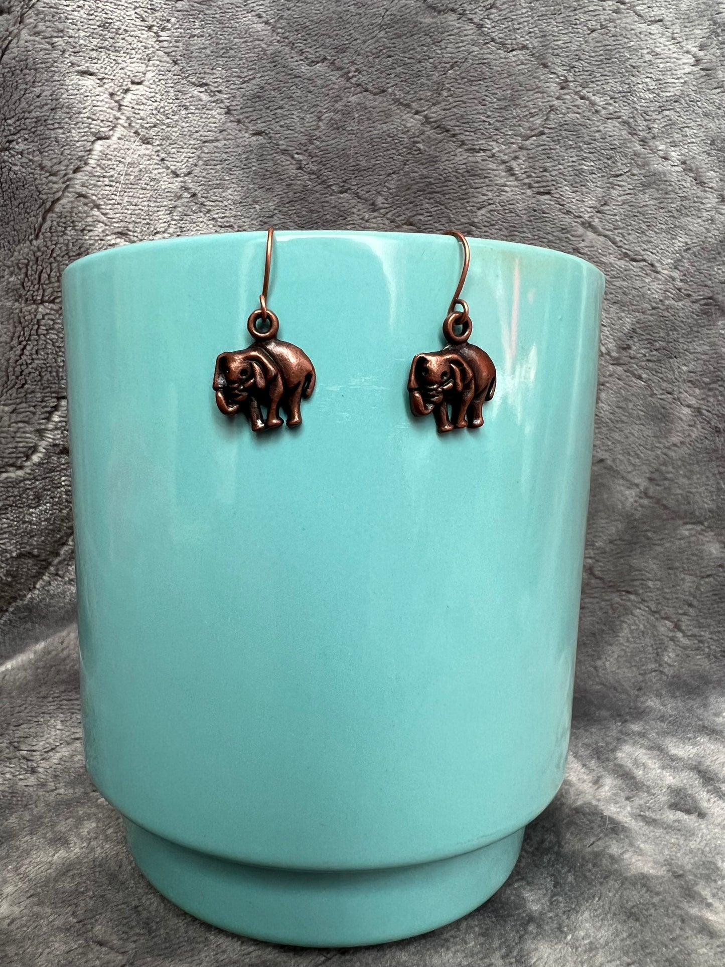 Earrings- Antique copper plated metal elephants.