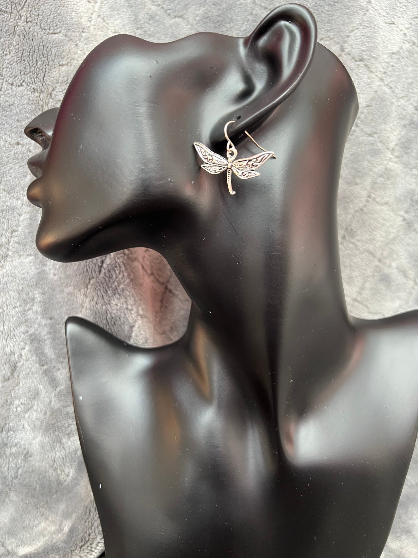 Earrings- Silver plated metal dragon flies.