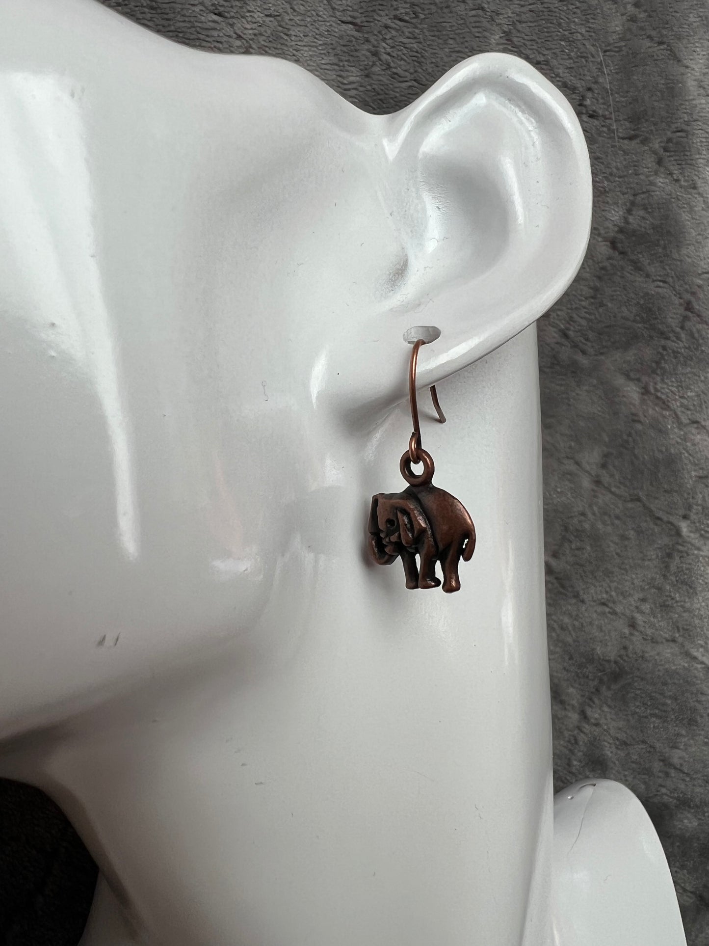 Earrings- Antique copper plated metal elephants.