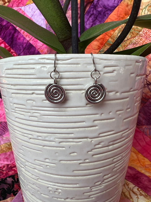 Earrings- Silver plated metal swirls.