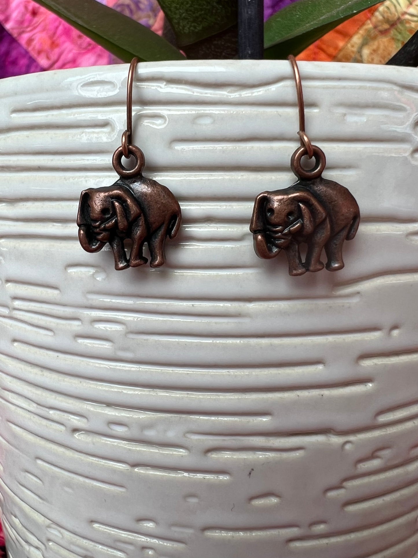 Earrings- Antique copper plated metal elephants.