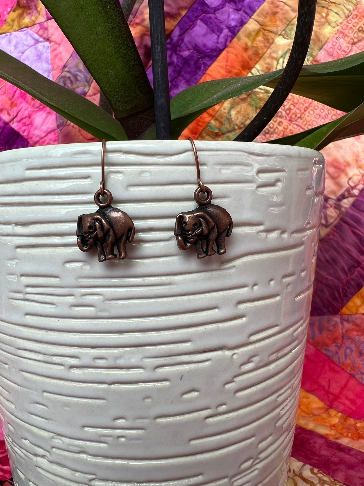 Earrings- Antique copper plated metal elephants.