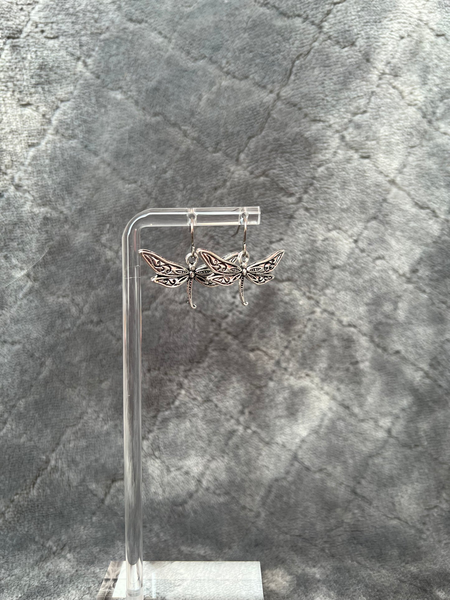 Earrings- Silver plated metal dragon flies.