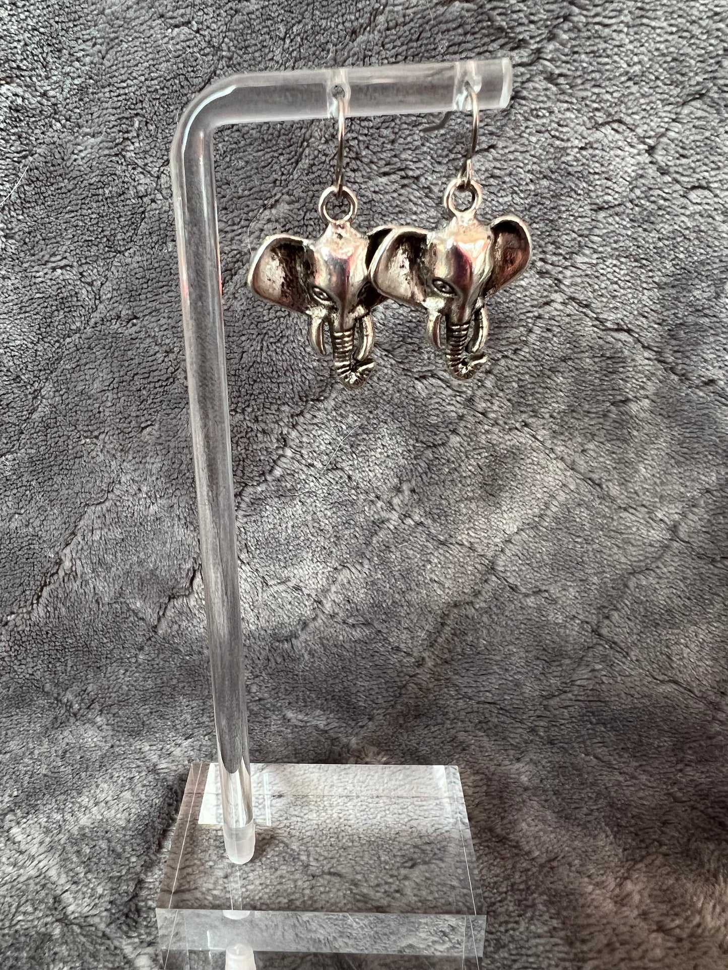 Earrings- Silver plated metal elephants.