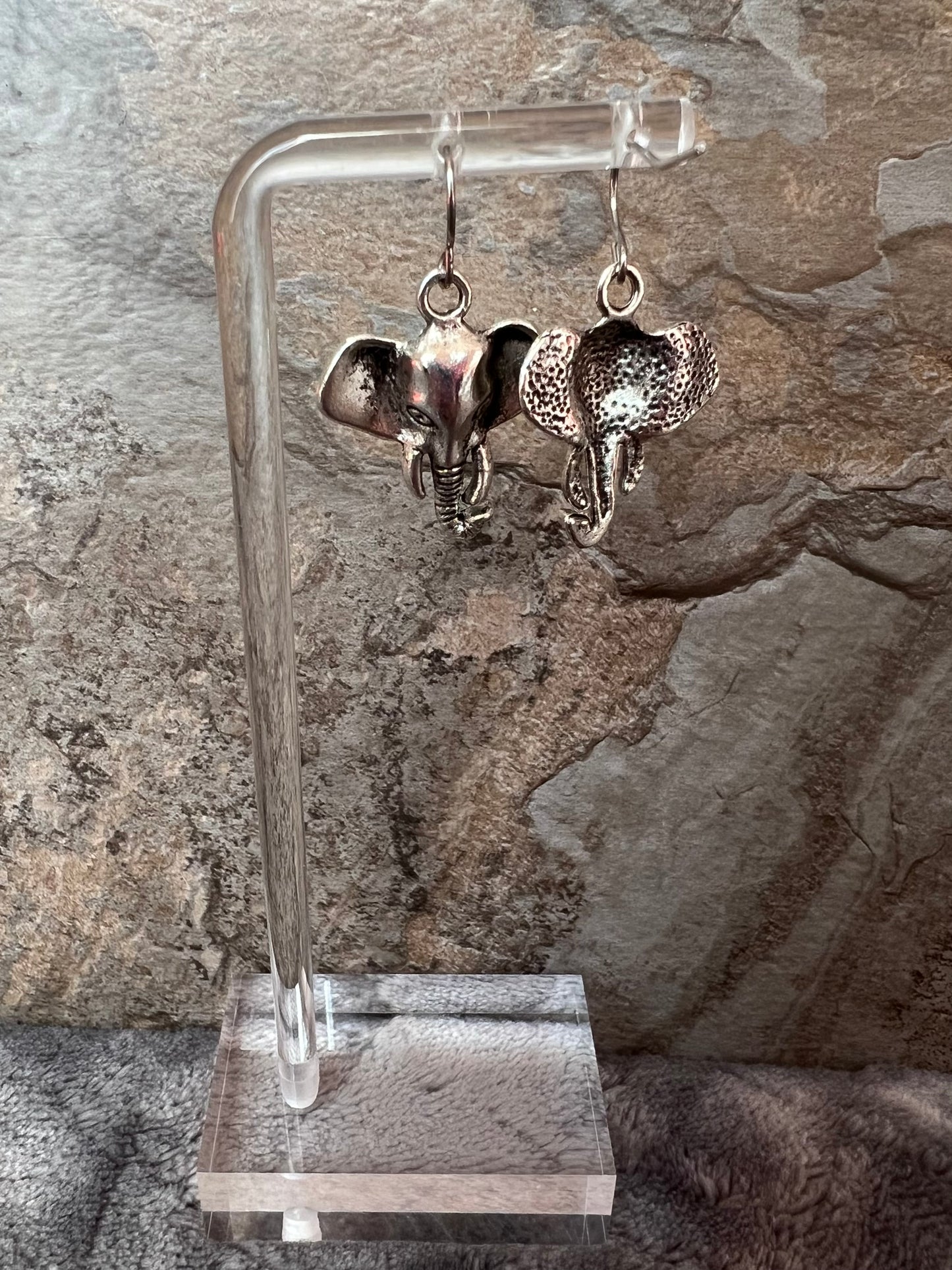 Earrings- Silver plated metal elephants.