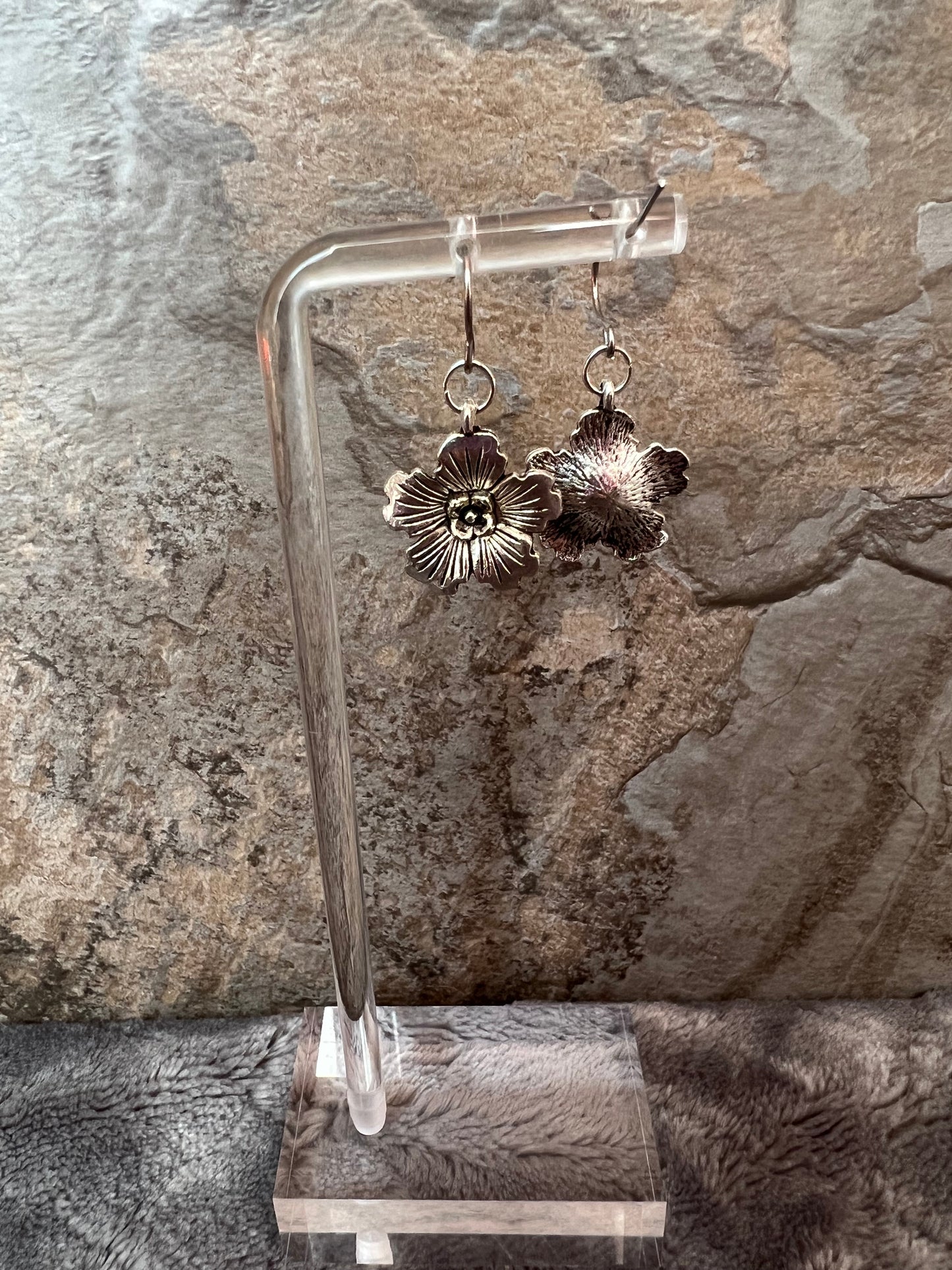 Earrings- Silver plated metal hibiscus flowers.