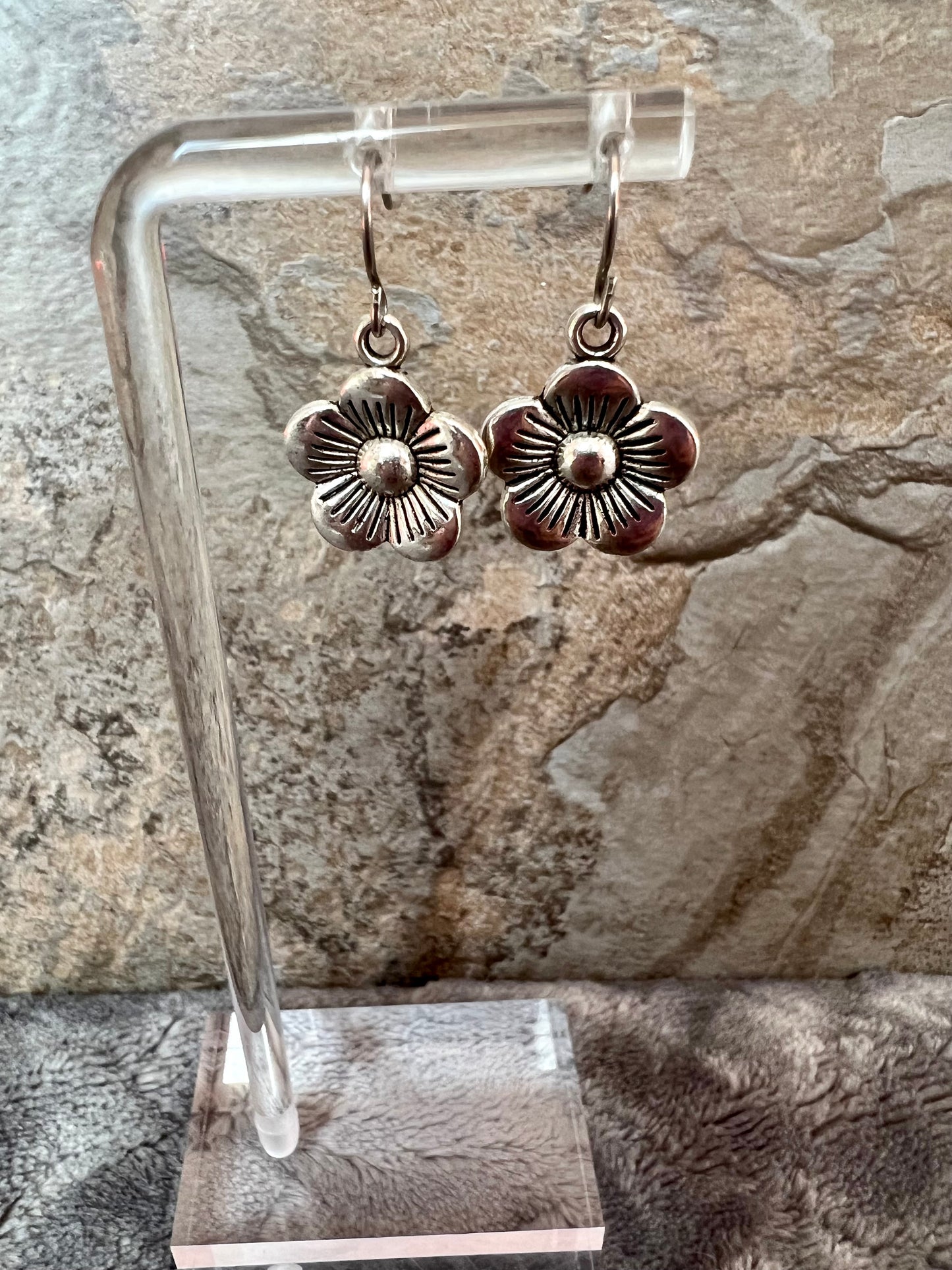 Earrings- Silver plated metal flowers.