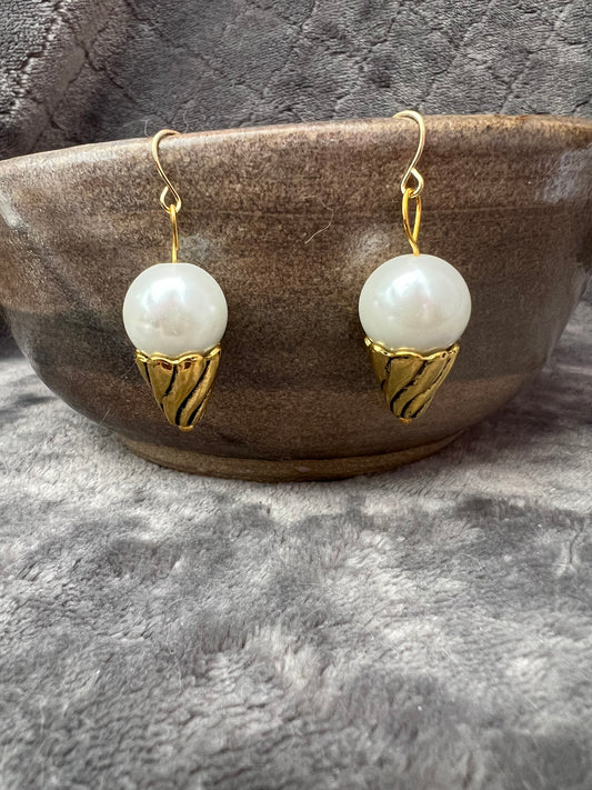 Earrings- Ice cream cones. Gold plated metal with patina cones with white faux pearl.