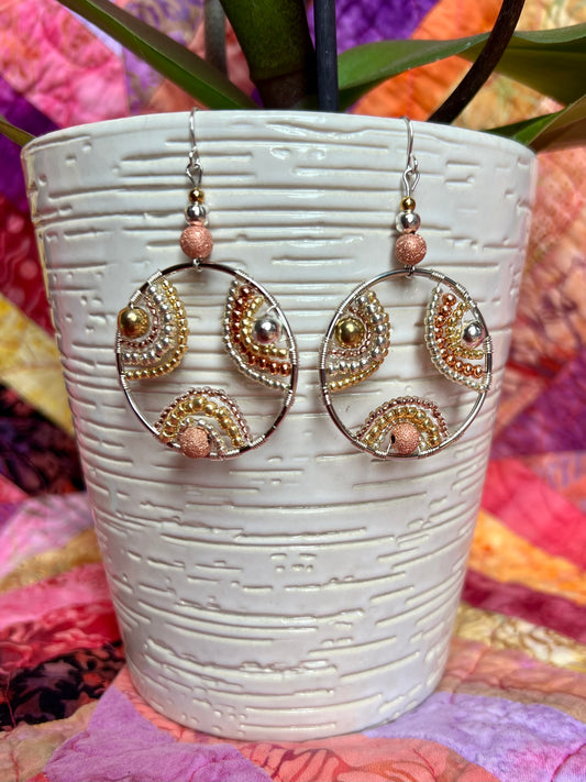 Earrings- Silver plated hoops & wires with silver, gold, and copper plated beads.