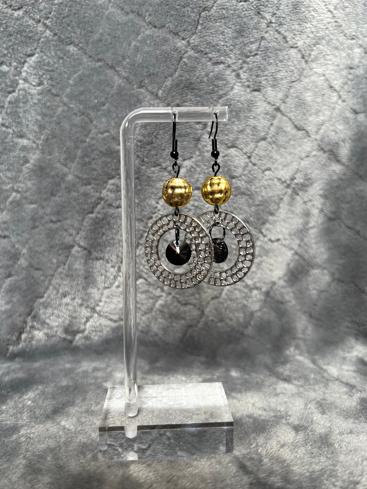 Earrings- Black plated wires, gun metal hoops, antiqued gold plated beads, & black crystals.