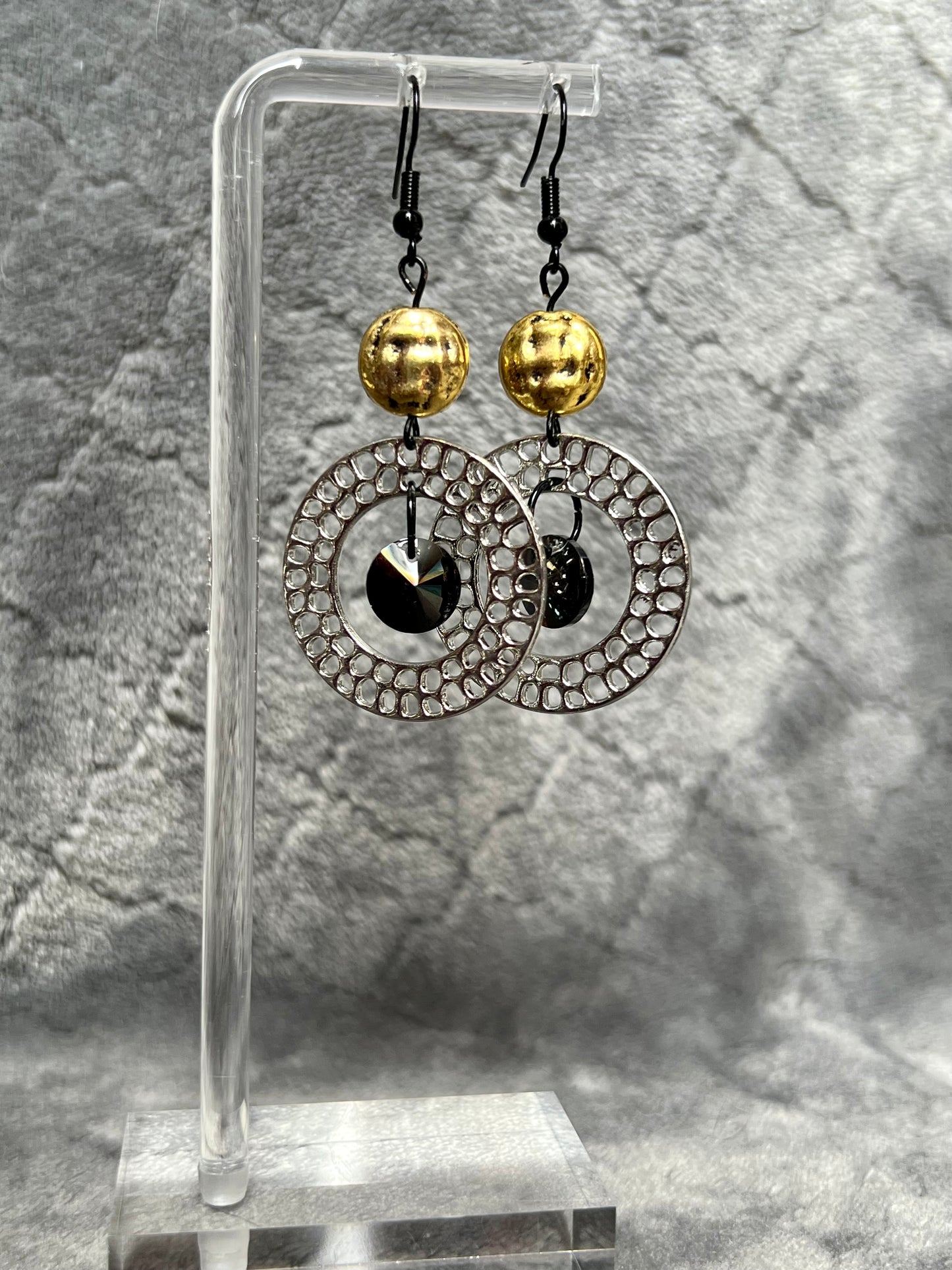 Earrings- Black plated wires, gun metal hoops, antiqued gold plated beads, & black crystals.