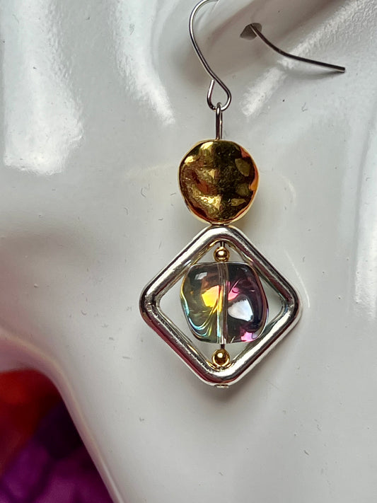 Earrings- Silver plated hooks, diamond shaped window bead, and rainbow coated pressed glass.