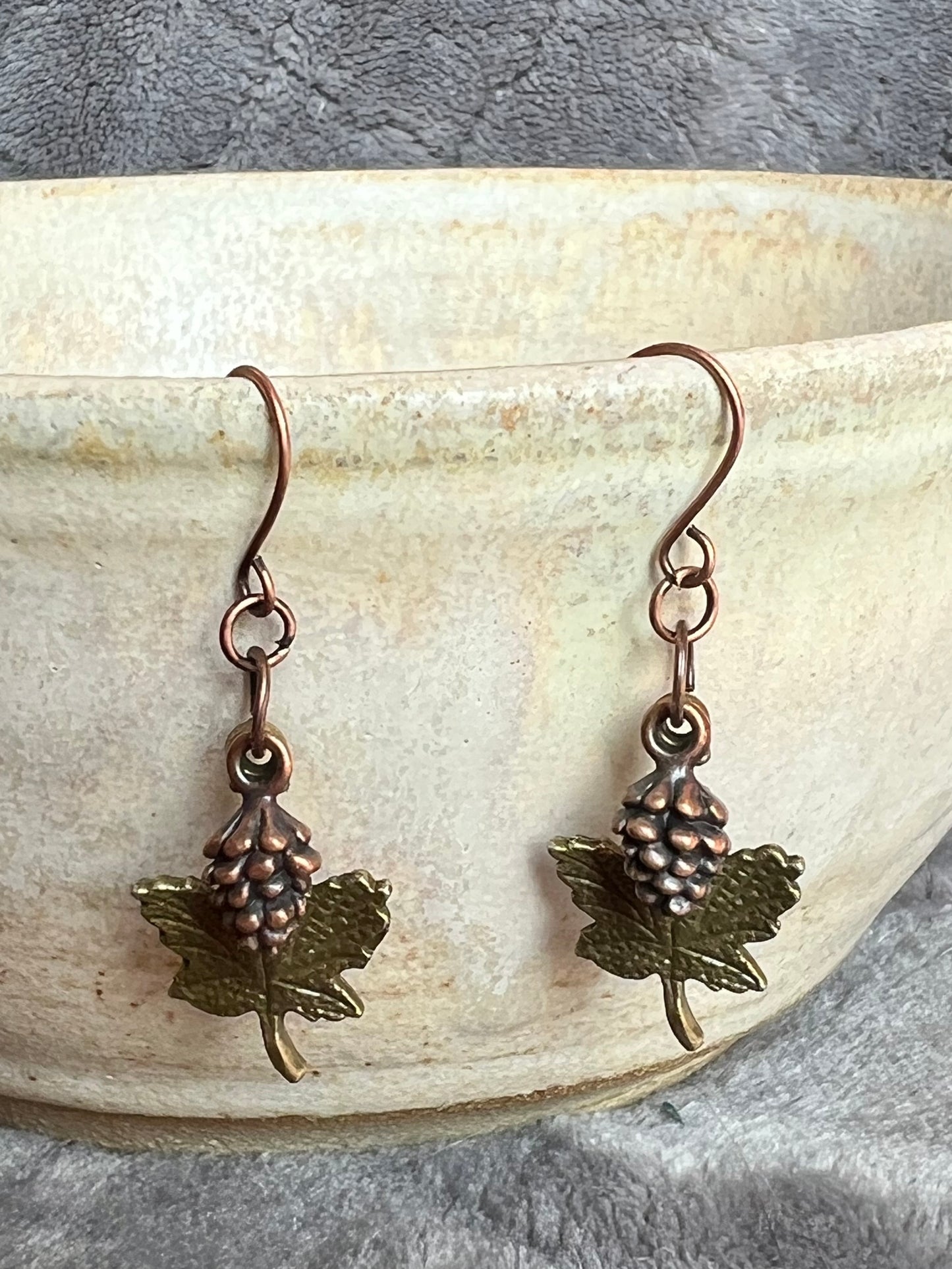 Earrings- Antique copper plated pine cone charms and antique gold plated maple leaf charms.