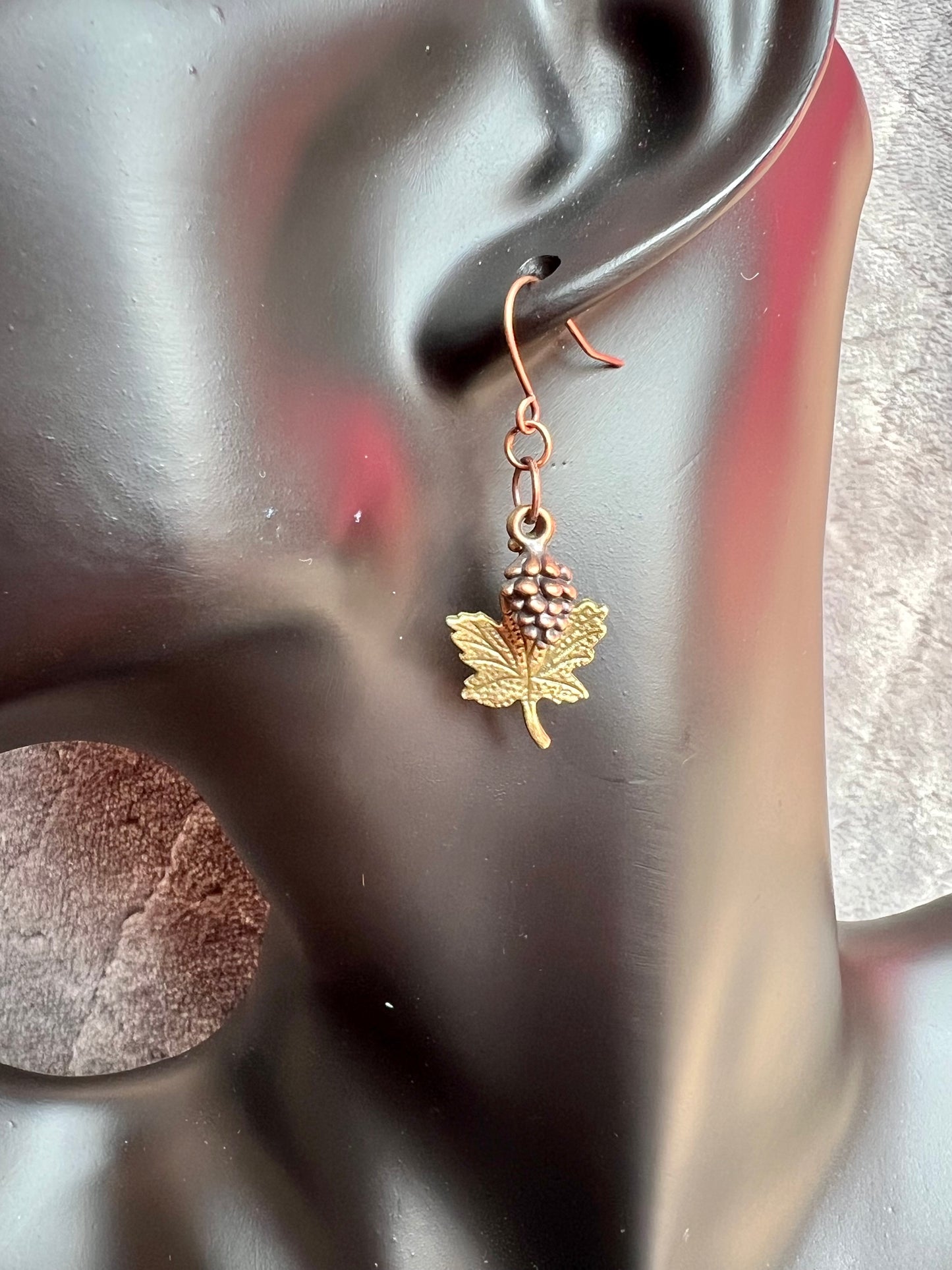 Earrings- Antique copper plated pine cone charms and antique gold plated maple leaf charms.