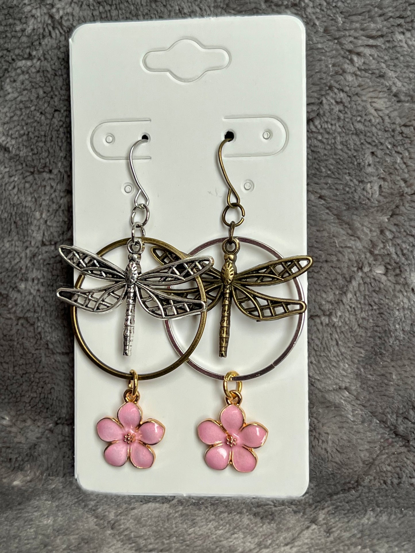 Earrings- Dragonfly earrings asymmetrical in color. Antique gold and silver dragon flies and hoops with pink flower charm.