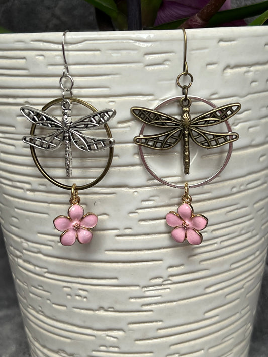 Earrings- Dragonfly earrings asymmetrical in color. Antique gold and silver dragon flies and hoops with pink flower charm.