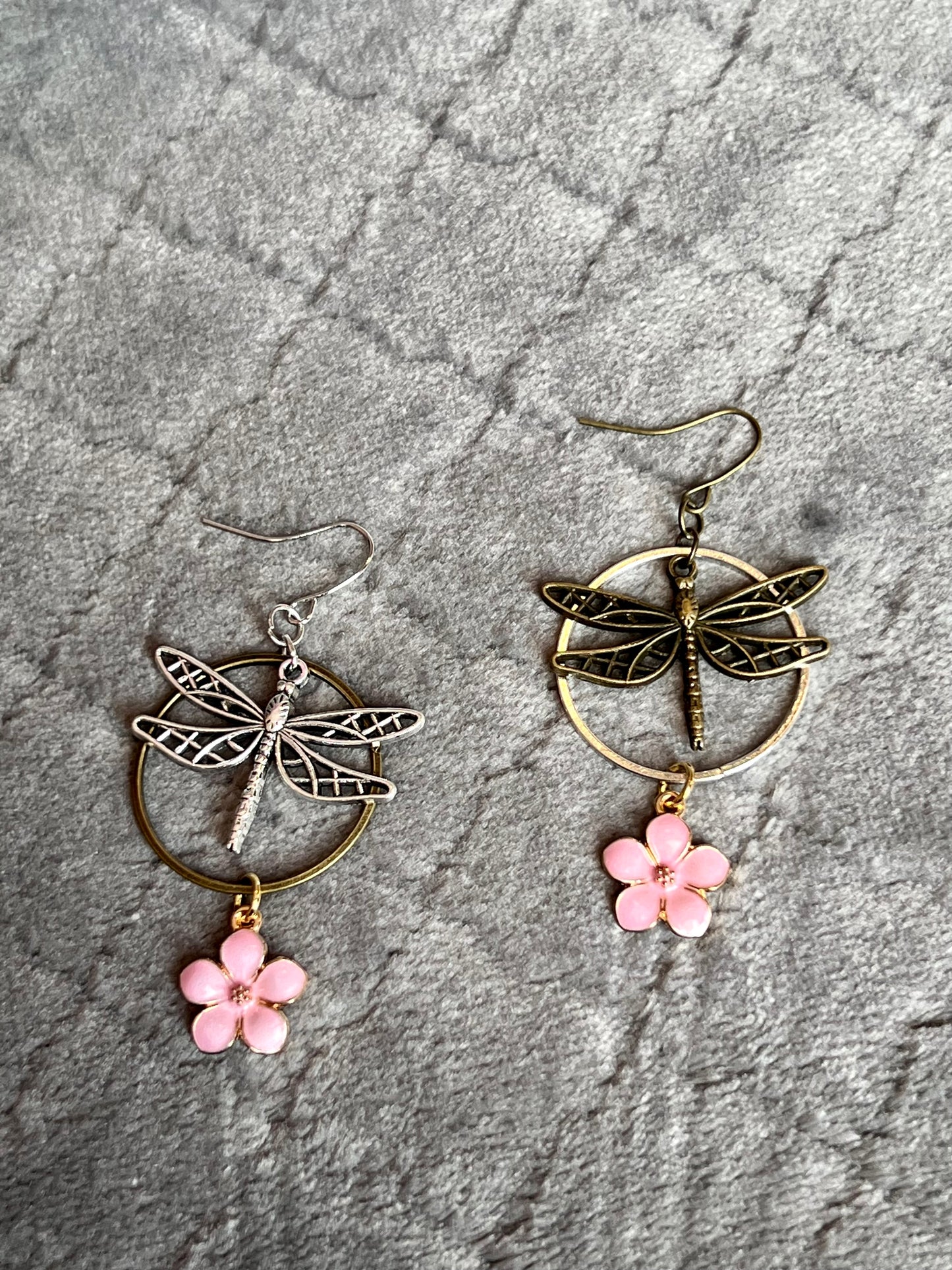 Earrings- Dragonfly earrings asymmetrical in color. Antique gold and silver dragon flies and hoops with pink flower charm.