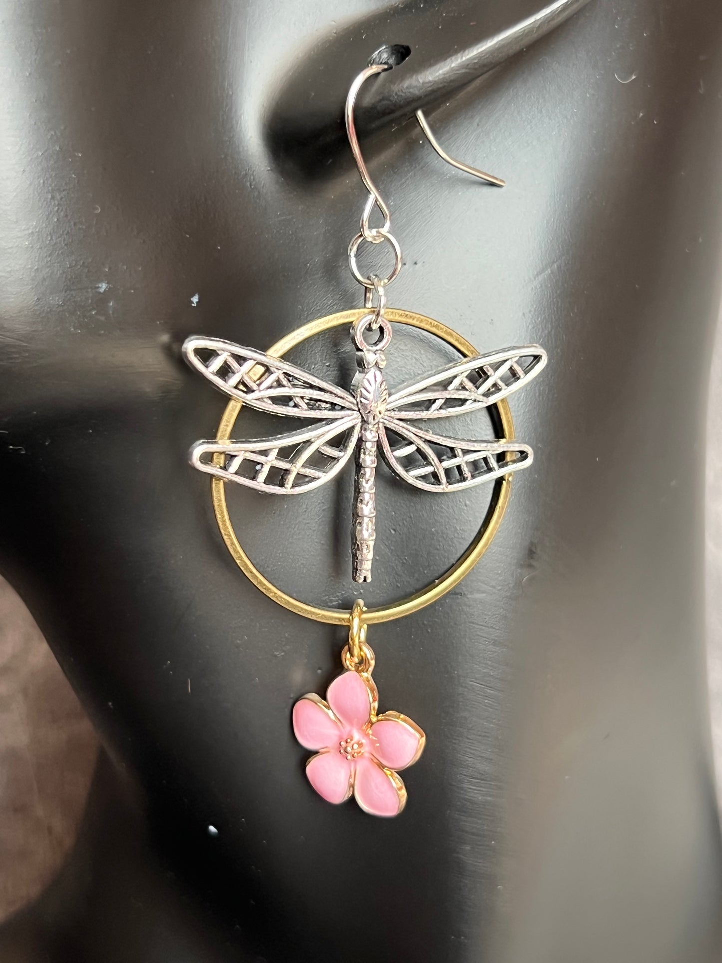 Earrings- Dragonfly earrings asymmetrical in color. Antique gold and silver dragon flies and hoops with pink flower charm.