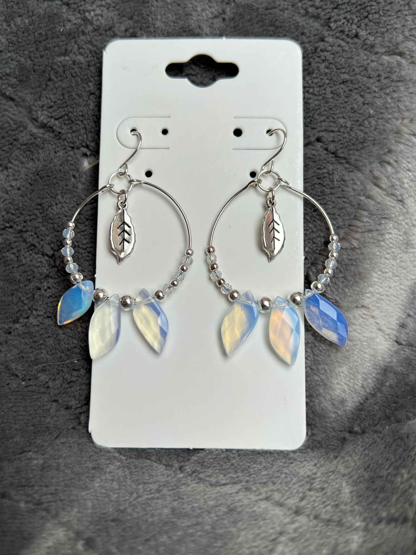 Earrings- Silver plated ear wires with opal quartz leaves and opal quartz spacer beads on a silver plated hoop.