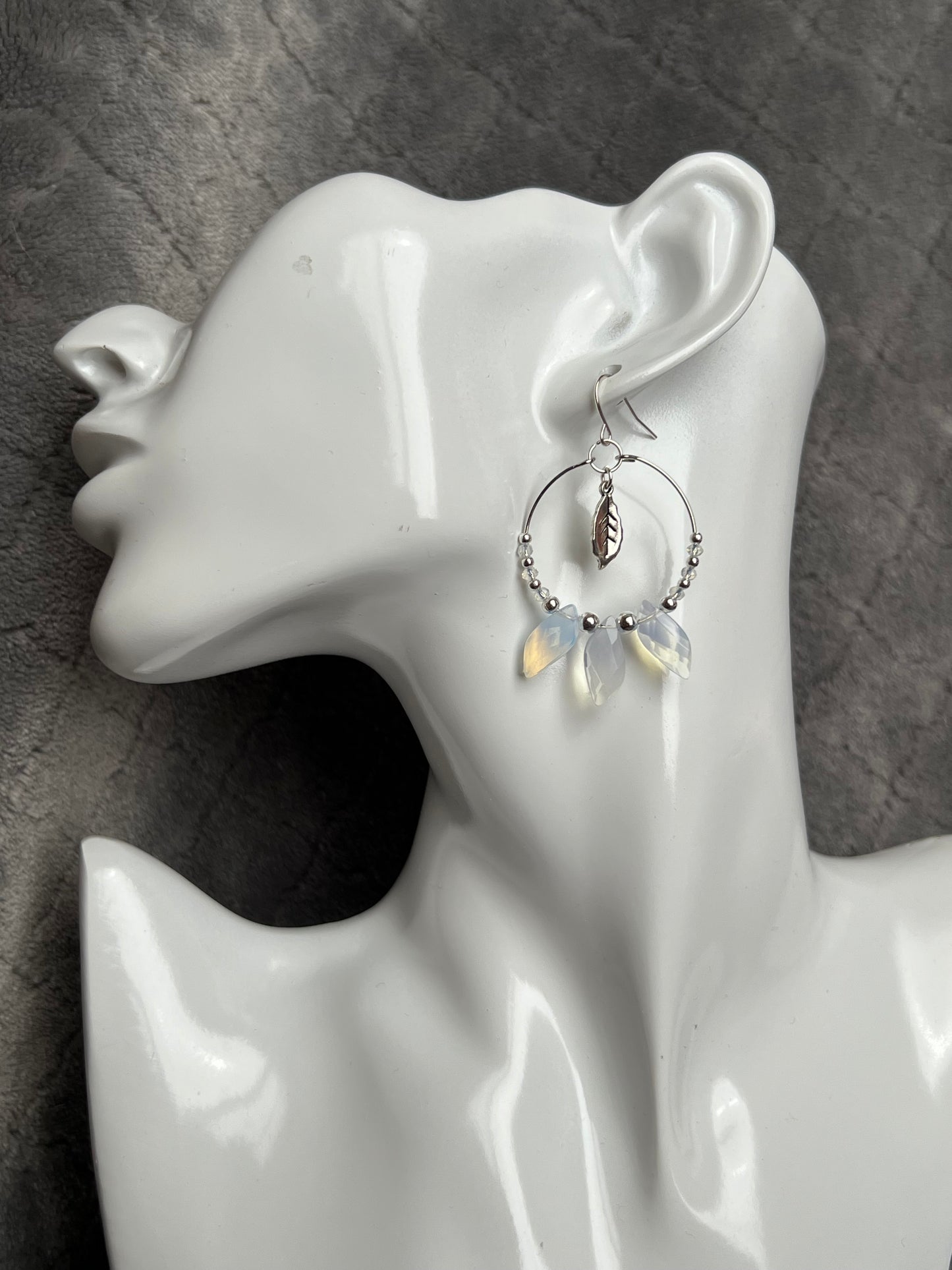 Earrings- Silver plated ear wires with opal quartz leaves and opal quartz spacer beads on a silver plated hoop.