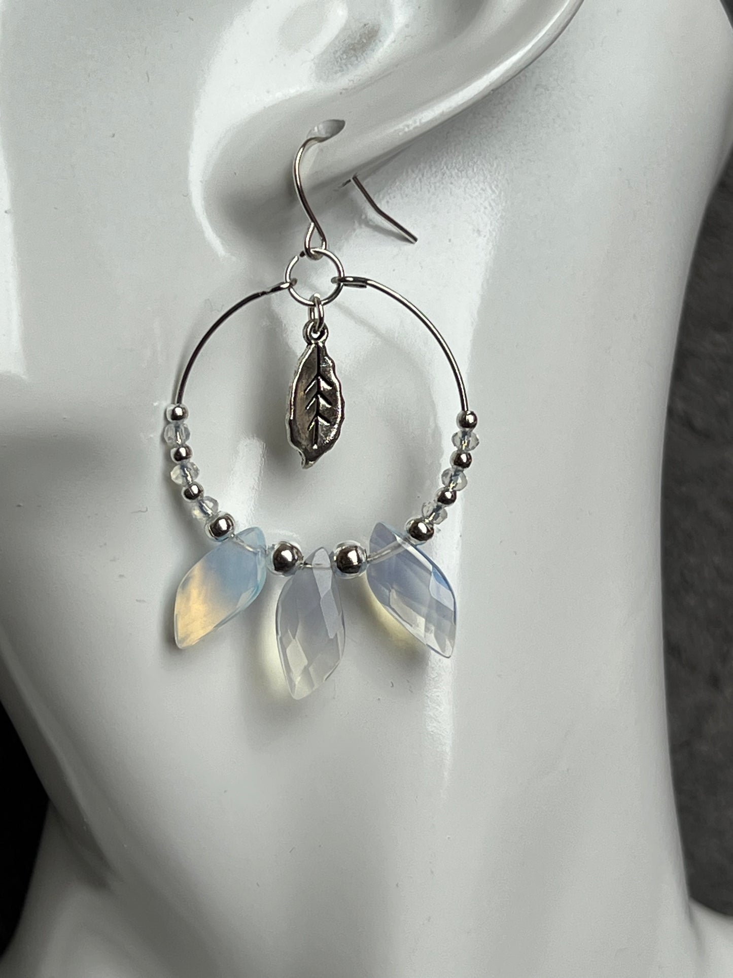 Earrings- Silver plated ear wires with opal quartz leaves and opal quartz spacer beads on a silver plated hoop.