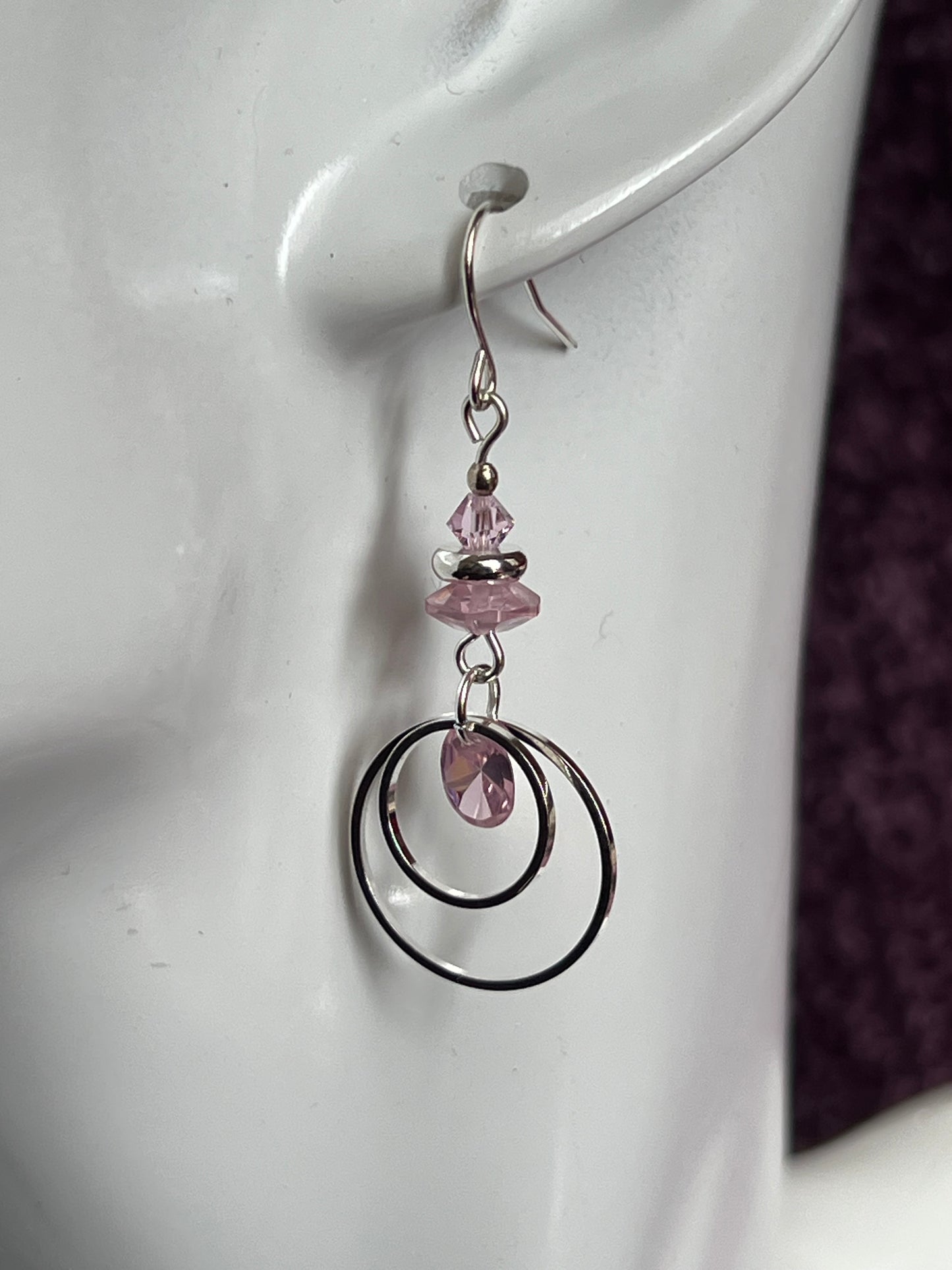 Earrings- Silver plated metal with Swarovski bicone crystals and cubic zirconia beads. Multiple colors available.